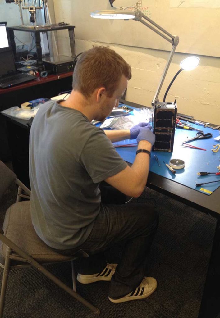 Spire satellite being manufactured in the early days