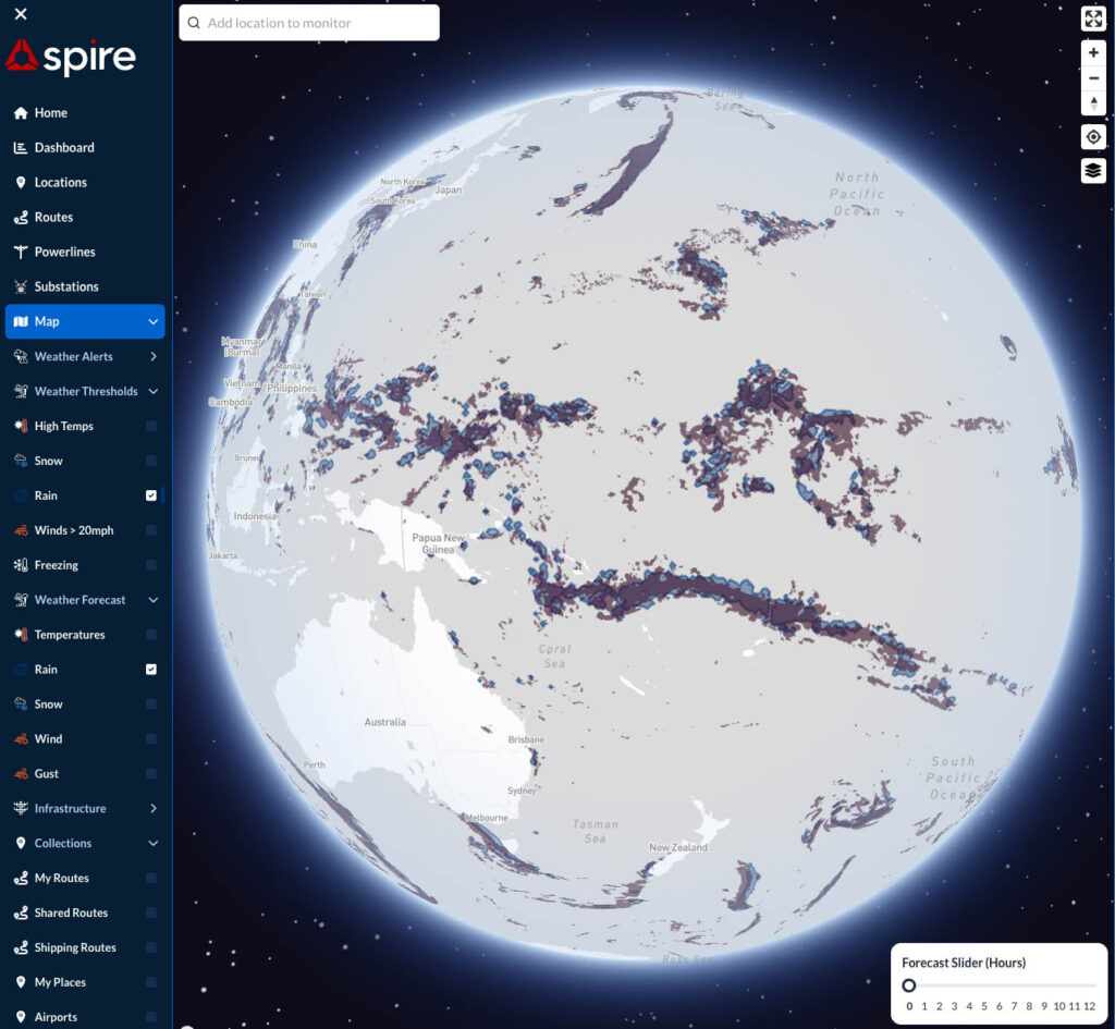 Spire's Weather dashboard showing rain warnings across the Pacific Ocean north of Australia
